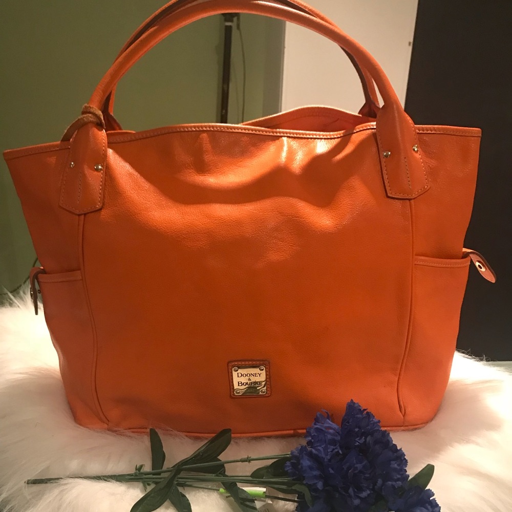 Dooney and Bourke orange carryon bag